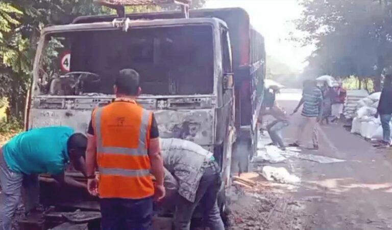 Fire on a cargo truck and attack on police vehicles in Madaripur শিবচরে ট্রাকে আগুন, ভাঙচুর