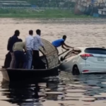 Private Car Falls Into River While Boarding Ferry in Narayanganj নবীগঞ্জ ফেরিঘাটে নদীতে পড়ে যাওয়া গাড়ি উদ্ধার