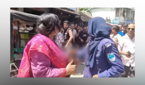 পুলিশের সামনে নারীকে লাথি, রাজবাড়ীতে ব্যবসায়ী বিরোধে তুলকালাম